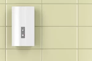 a water heater mounted on a wall with creamy yellow tile